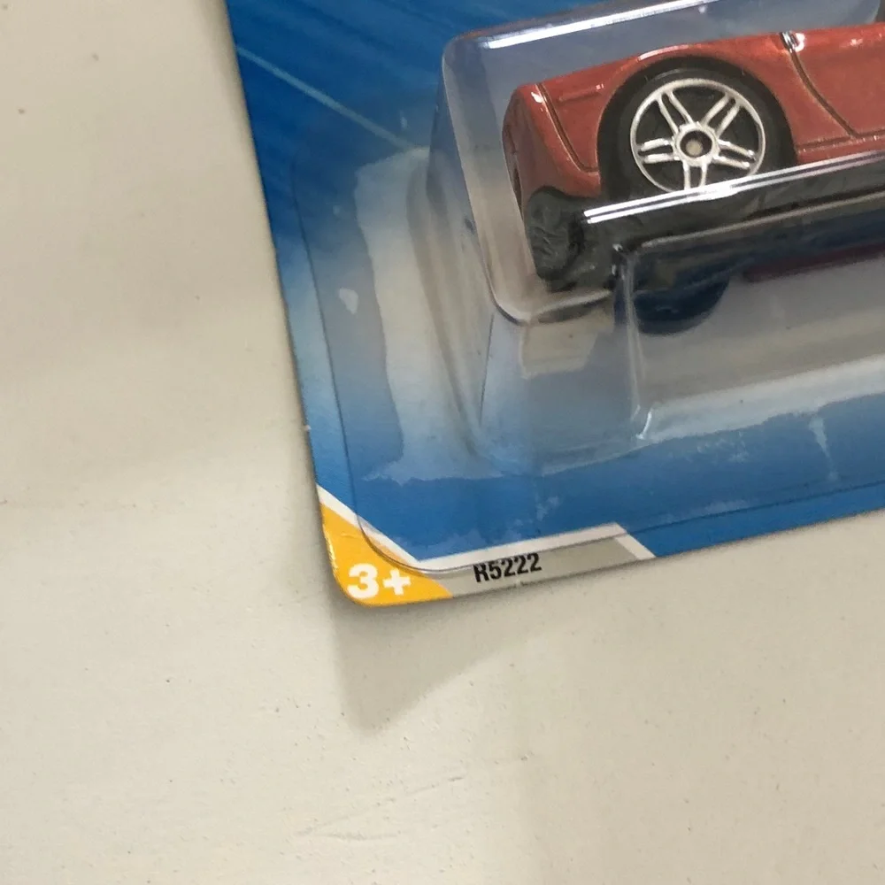New in package Hot Wheels Corvette C6 Burnt Orange